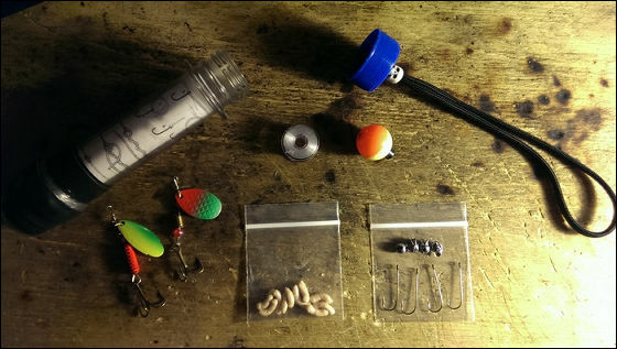Pocket size capsule packed with a set of fishing tools Pocket