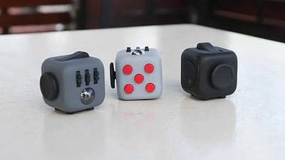 Fidget Cube: A Vinyl Desk Toy by Matthew and Mark McLachlan — Kickstarter