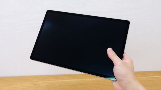 Holding the Galaxy Tab S10+ in one hand