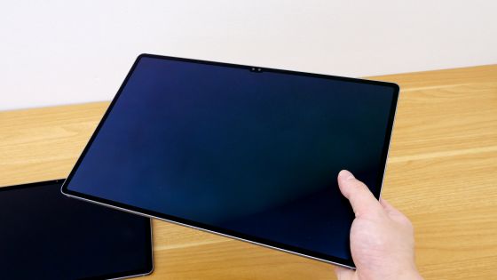Holding the Galaxy Tab S10 Ultra in one hand